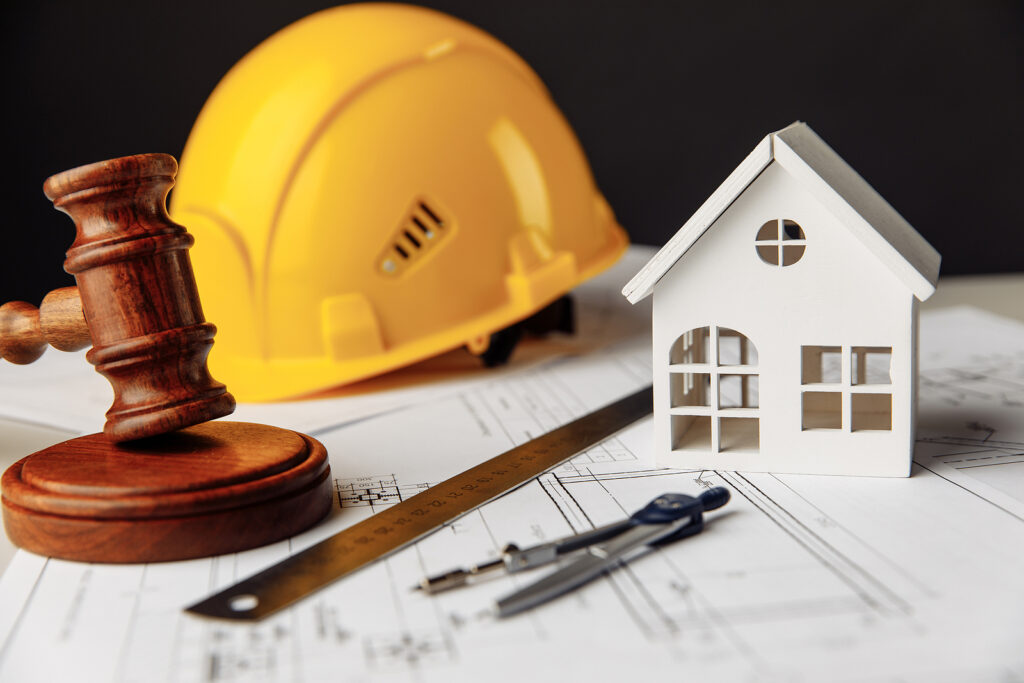 Judge Gavel, White House And Yellow Hard Hat With Drawing Tools